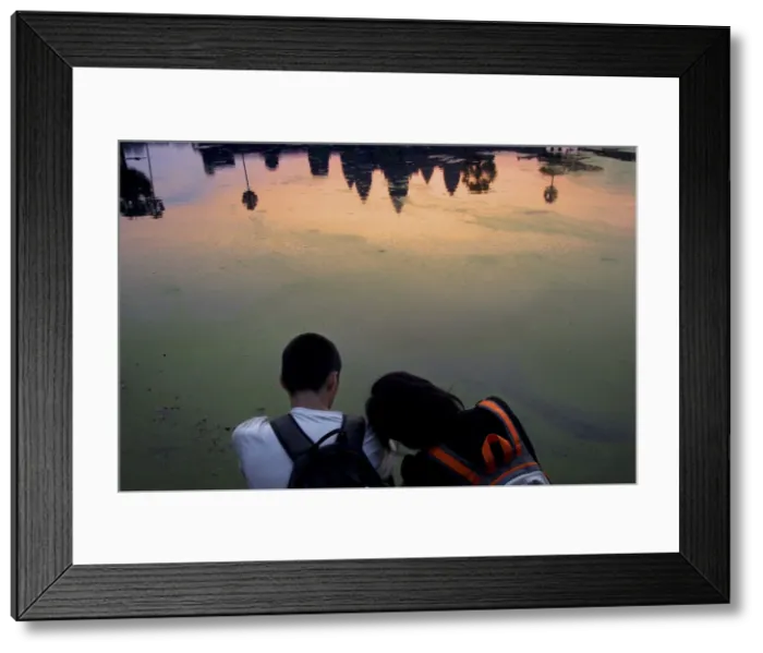 Framed Print : Watching the sunrise over Angkor Wat, Cambodia, Indochina, Southeast Asia, Asia Framed Print : Watching the sunrise over Angkor Wat, Cambodia, Indochina, Southeast Asia, Asia