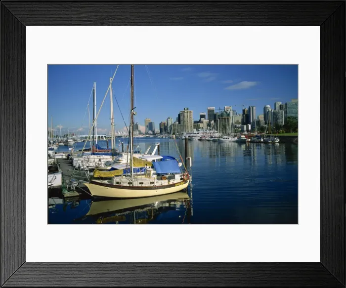 Framed Print : Boats in the marina at Stanley Park with the city skyline of Vancouver behind Framed Print : Boats in the marina at Stanley Park with the city skyline of Vancouver behind