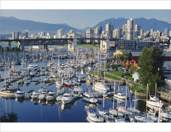 City centre seen across marina in Granville Basin, Vancouver, British Columbia, Canada