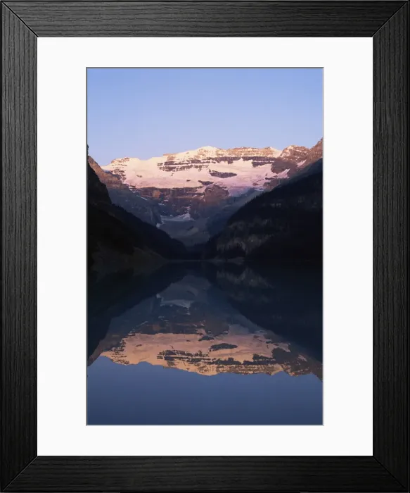Framed Print : View to Mount Victoria across the still waters of Lake Louise, at sunrise in summer Framed Print : View to Mount Victoria across the still waters of Lake Louise, at sunrise in summer