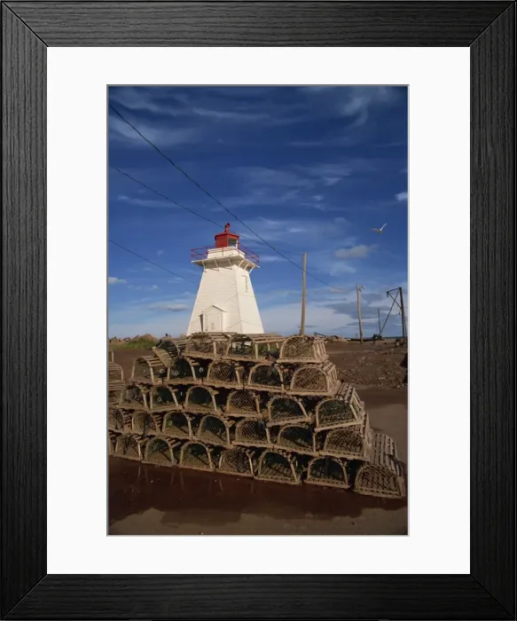 Framed Print : Fishing baskets and lighthouse on Prince Edward Island, Canada, North America Framed Print : Fishing baskets and lighthouse on Prince Edward Island, Canada, North America