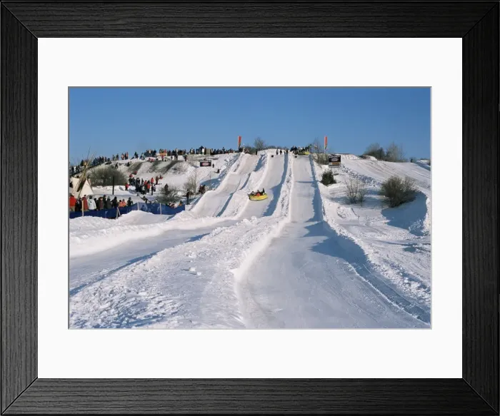 Framed Print : Sledding during winter carnival, Quebec, Canada, North America Framed Print : Sledding during winter carnival, Quebec, Canada, North America