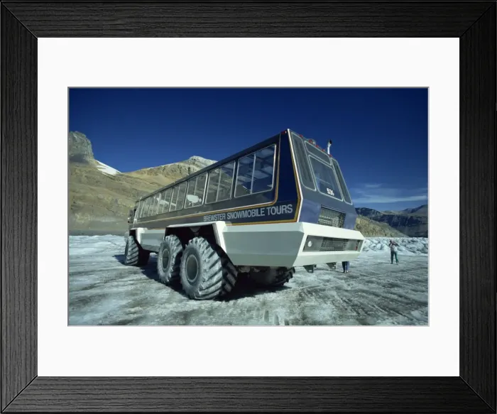 Framed Print : Snowmobile that takes tourists onto the Athabasca Glacier in Jasper National Park in the Rocky Mountains in British Columbia, Canada Framed Print : Snowmobile that takes tourists onto the Athabasca Glacier in Jasper National Park in the Rocky Mountains in British Columbia, Canada