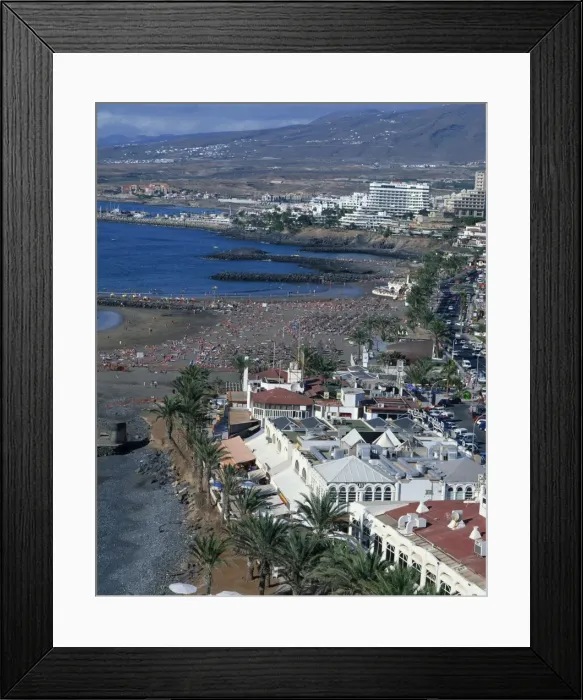Framed Print : Tourists on the beach at Playa Troya, Puerto Colon, at the Playa de Las Americas Framed Print : Tourists on the beach at Playa Troya, Puerto Colon, at the Playa de Las Americas
