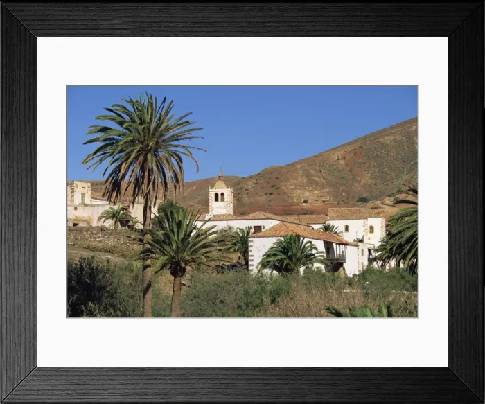 Framed Print : Palm trees, houses and church at Betancuria, on Fuerteventura in the Canary Islands