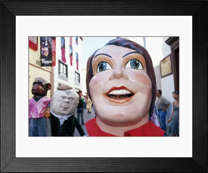 Framed Print : Giant masks on parade during celebration of Descent of Our Lady of Snows fiesta Framed Print : Giant masks on parade during celebration of Descent of Our Lady of Snows fiesta