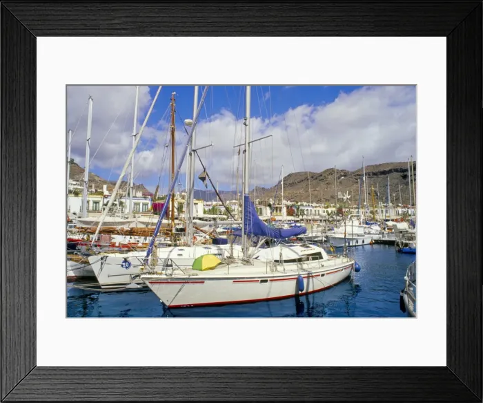 Framed Print : Boats in Puerto Mogan harbour and promenade in background, Puerto de Mogan Framed Print : Boats in Puerto Mogan harbour and promenade in background, Puerto de Mogan