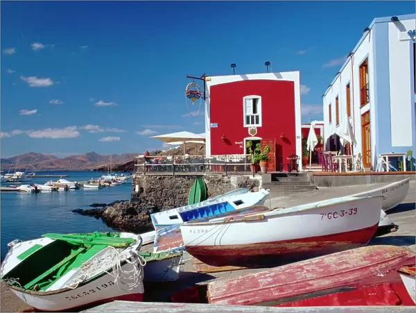 Boats and old red house, Old Port, Puerto del Carmen, Lanzarote, Canary Islands