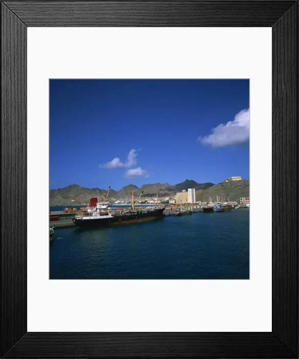 Framed Print : Cargo ships in port, with the town and mountains in the background, Mindelo Framed Print : Cargo ships in port, with the town and mountains in the background, Mindelo