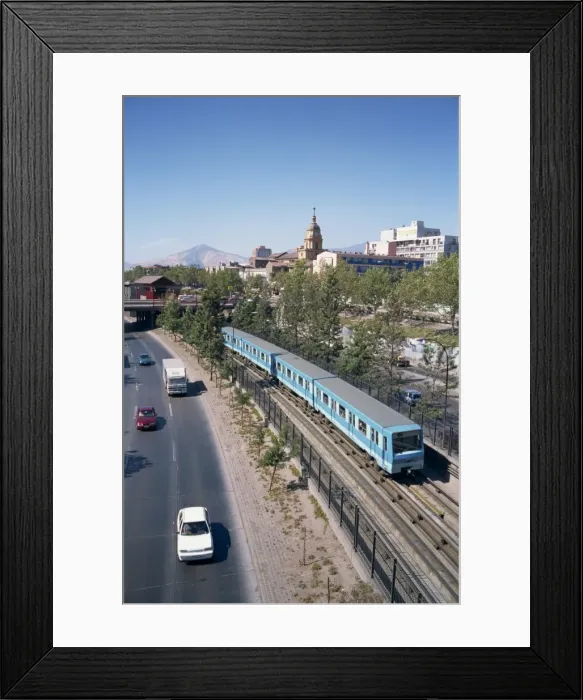 Framed Print : The Metro train alongside a road in Santiago, Chile, South America Framed Print : The Metro train alongside a road in Santiago, Chile, South America
