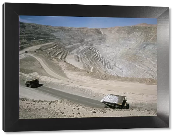 Chuqui open-pit copper mine, 4km long, 720m d eep, trucks each carrying 300t of ore