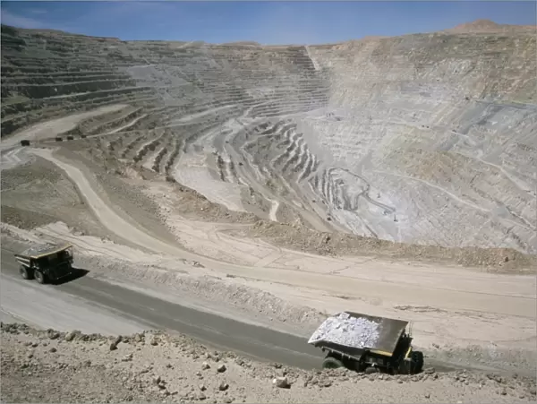 Chuqui open-pit copper mine, 4km long, 720m d eep, trucks each carrying 300t of ore