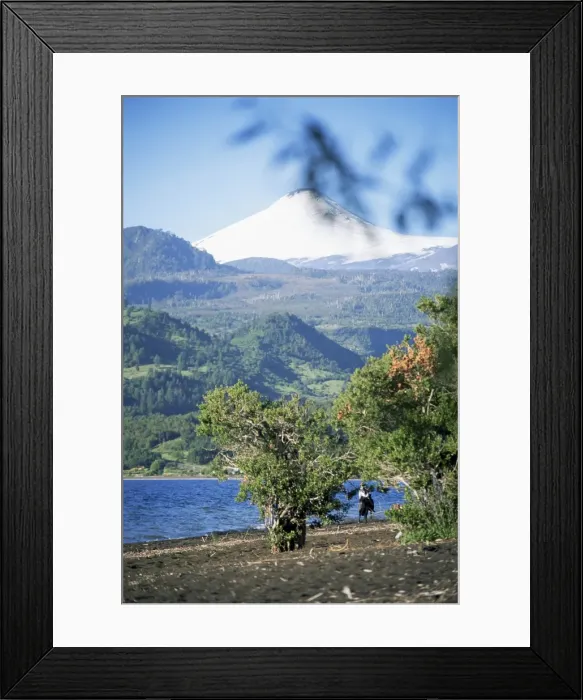 Framed Print : Man riding horse along beach with Villarica volcano in the background, Villarica Lake Framed Print : Man riding horse along beach with Villarica volcano in the background, Villarica Lake