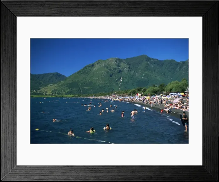 Framed Print : Summer crowds enjoy warm water, Lake Villarica, Lake District, Chile, South America Framed Print : Summer crowds enjoy warm water, Lake Villarica, Lake District, Chile, South America