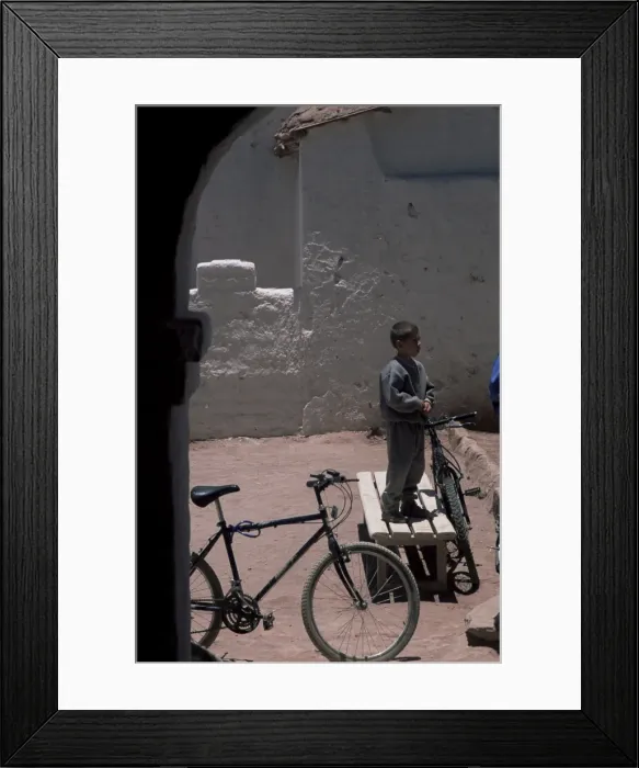 Framed Print : Boy and bike, San Pedro de Atacama, Chile, South America Framed Print : Boy and bike, San Pedro de Atacama, Chile, South America