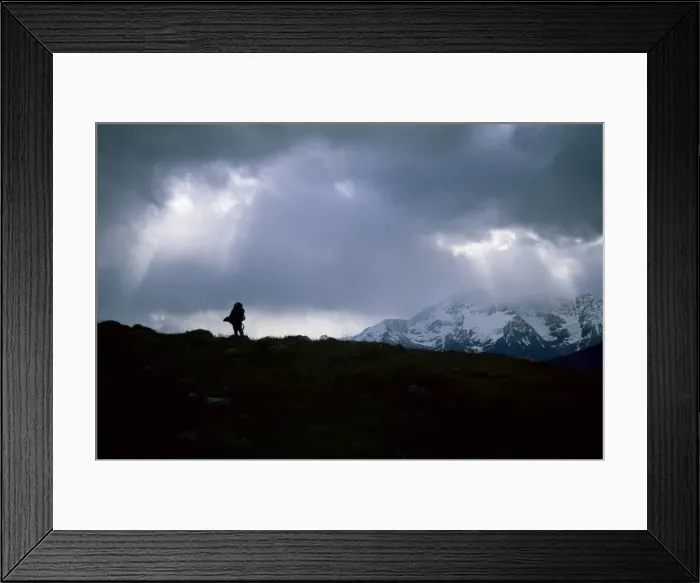 Framed Print : Silhouette of backpacker making way over pass in the Torres Circuit hike Framed Print : Silhouette of backpacker making way over pass in the Torres Circuit hike