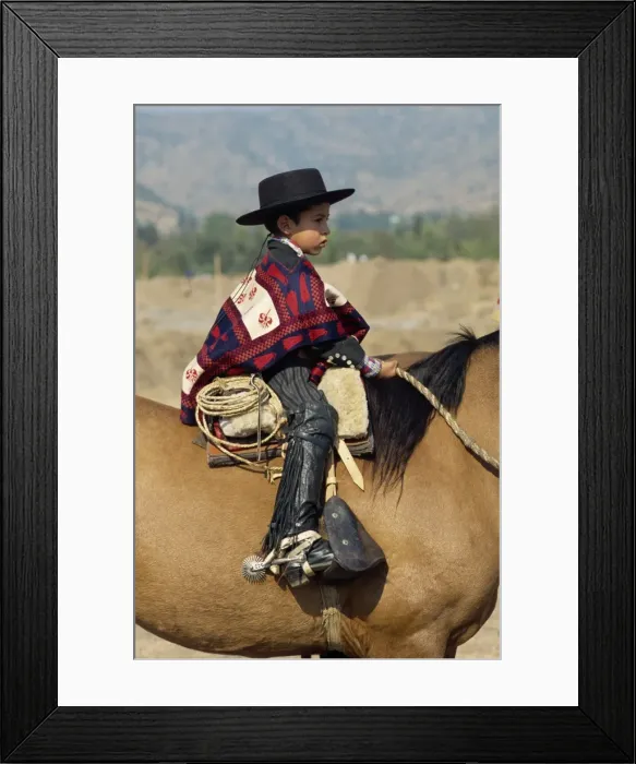 Framed Print : Young rider at the Fiesta de Cuasimodo, a traditional festival one week after Easter Framed Print : Young rider at the Fiesta de Cuasimodo, a traditional festival one week after Easter
