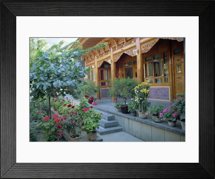 Framed Print : Pot plants, garden, and wooden Sala architecture in the north east of Qinghai Framed Print : Pot plants, garden, and wooden Sala architecture in the north east of Qinghai