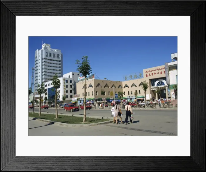 Framed Print : Street scene in the new wealthy town of Kuytun in Xinjiang, China, Asia Framed Print : Street scene in the new wealthy town of Kuytun in Xinjiang, China, Asia