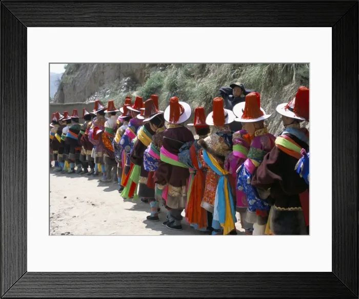 Framed Print : Line of people wearing Tibetan traditional dress, Tongren, Qinghai Province, China, Asia