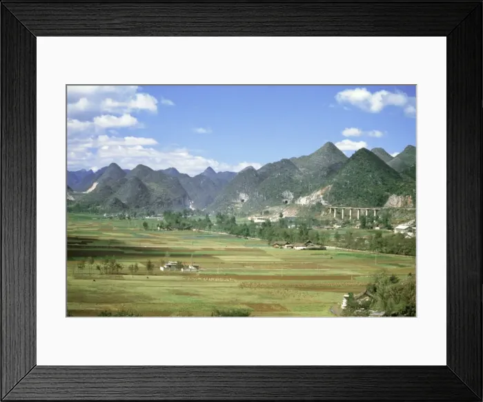 Framed Print : Conical limestone hills and Shanghai to Kunming Railway, Guilin, Shuicheng