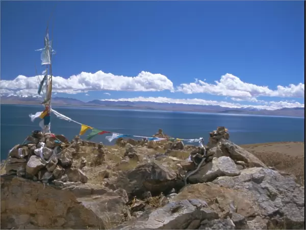 Prayer flags over sky burial site, Lake Manasarovar (Manasarowar), sacred lake just south of Kailas (Kailash), Tibet