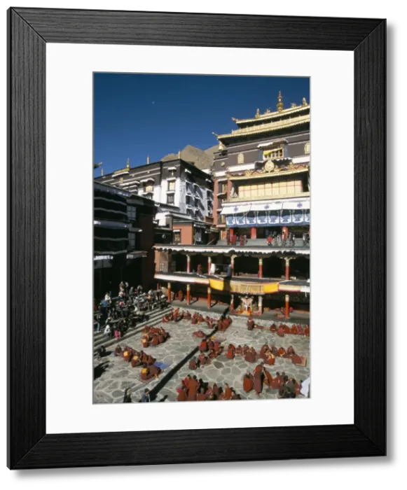 Framed Print : Monks debate in main courtyard, Tashilhunpo monastery, Shigatse (Xigatse) Framed Print : Monks debate in main courtyard, Tashilhunpo monastery, Shigatse (Xigatse)
