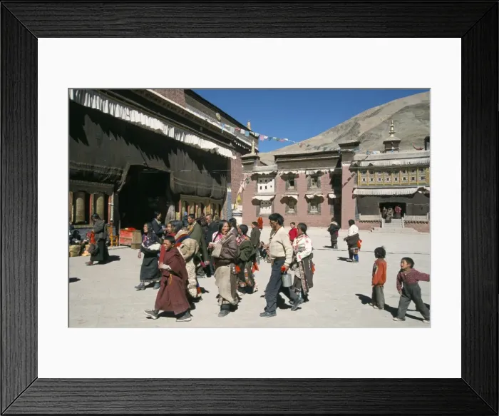 Framed Print : Pilgrims in monastery courtyard. Sakya, Tibet, China, Asia Framed Print : Pilgrims in monastery courtyard. Sakya, Tibet, China, Asia