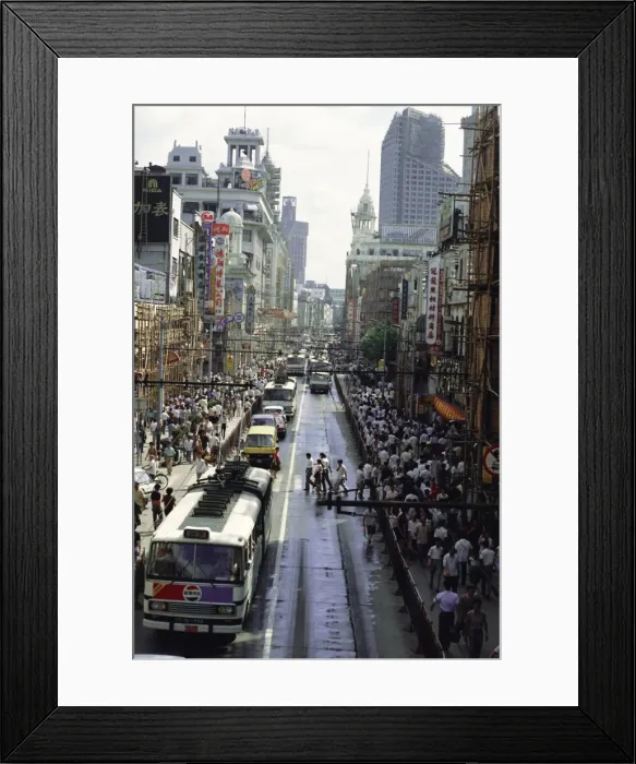 Framed Print : Nanjing Road, the main shopping street where cycles are banned to make space for buses Framed Print : Nanjing Road, the main shopping street where cycles are banned to make space for buses