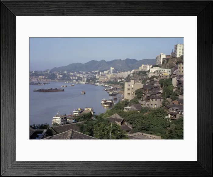 Framed Print : Town built on steep sandstone slopes above confluence of Yangtse and Jialing Rivers Framed Print : Town built on steep sandstone slopes above confluence of Yangtse and Jialing Rivers