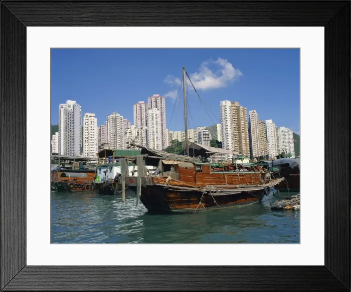 Framed Print : Boats in the harbour and high rise apartment buildings in the background at Aberdeen Framed Print : Boats in the harbour and high rise apartment buildings in the background at Aberdeen