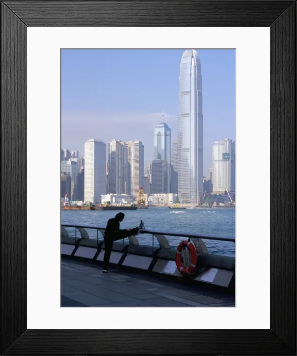 Framed Print : Morning exercise, Victoria Harbour and Two IFC Tower, Hong Kong, China, Asia Framed Print : Morning exercise, Victoria Harbour and Two IFC Tower, Hong Kong, China, Asia