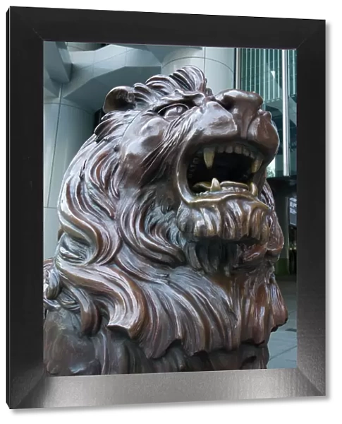 Bronze lion statue outside the HSBC Bank Headquarters, rubbing its paws is said to bring good luck