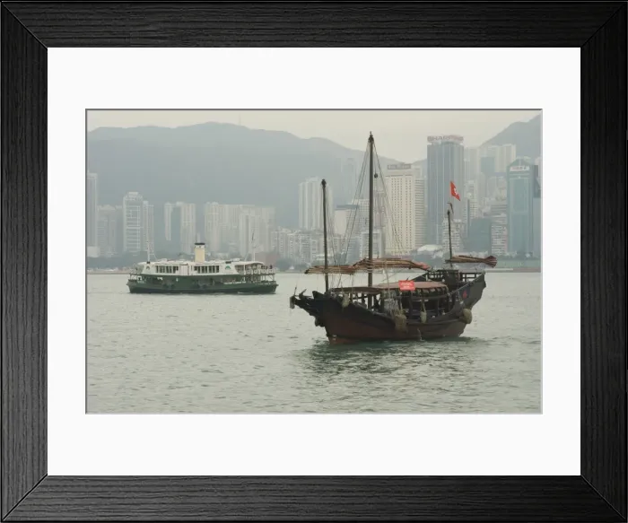 Framed Print : One of the last remaining Chinese sailing junks on Victoria Harbour, Hong Kong Framed Print : One of the last remaining Chinese sailing junks on Victoria Harbour, Hong Kong