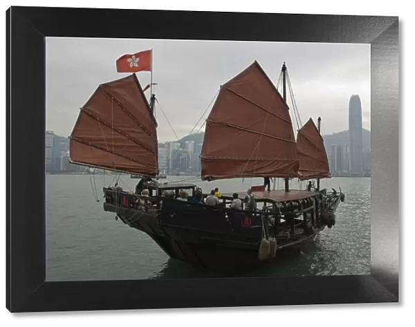 One of the last remaining Chinese sailing junks on Victoria Harbour, Hong Kong