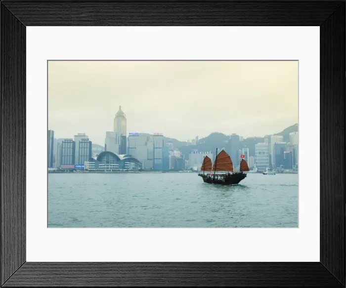 Framed Print : One of the last remaining Chinese sailing junks on Victoria Harbour, Hong Kong Framed Print : One of the last remaining Chinese sailing junks on Victoria Harbour, Hong Kong