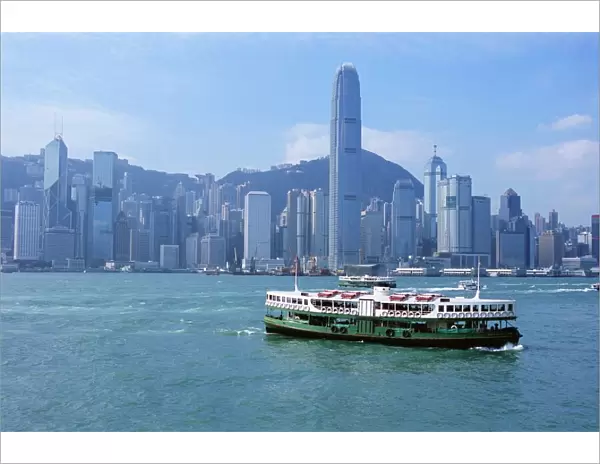 Star Ferry crossing Victoria Harbour towards Hong Kong Island, with Central skyline beyond