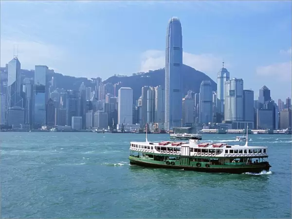 Star Ferry crossing Victoria Harbour towards Hong Kong Island, with Central skyline beyond