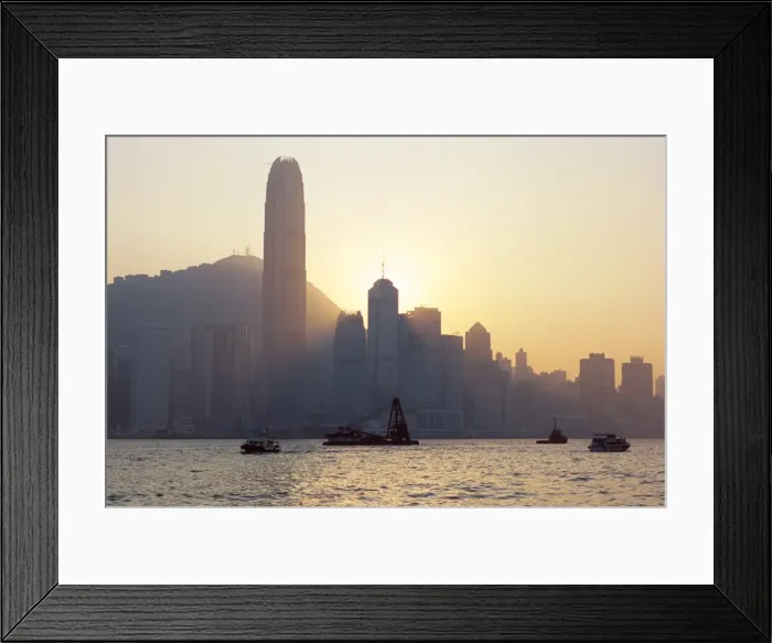 Framed Print : Two IFC Building and Hong Kong Island skyline across Victoria Harbour at dusk Framed Print : Two IFC Building and Hong Kong Island skyline across Victoria Harbour at dusk