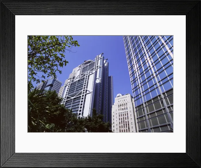 Framed Print : H. S. B. C. Building on left, old Bank of China Building in centre, and Cheung Kong Center on right Framed Print : H. S. B. C. Building on left, old Bank of China Building in centre, and Cheung Kong Center on right