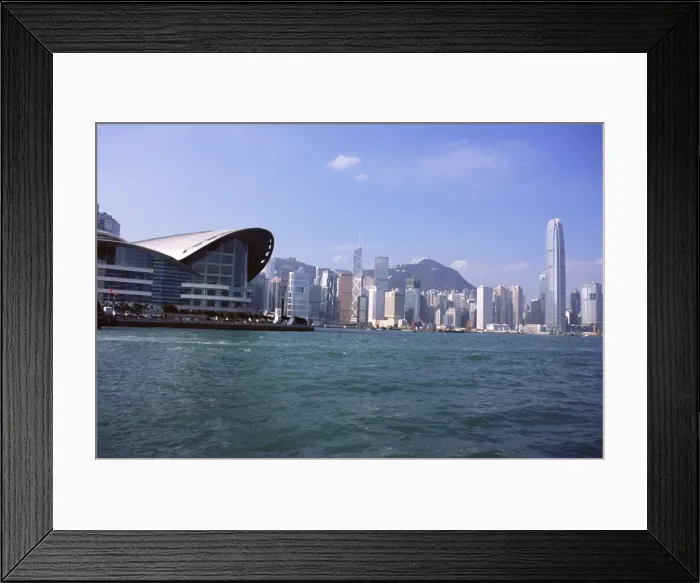 Framed Print : Exhibition and Convention Center and skyline, Victoria Harbour, Hong Kong, China, Asia Framed Print : Exhibition and Convention Center and skyline, Victoria Harbour, Hong Kong, China, Asia