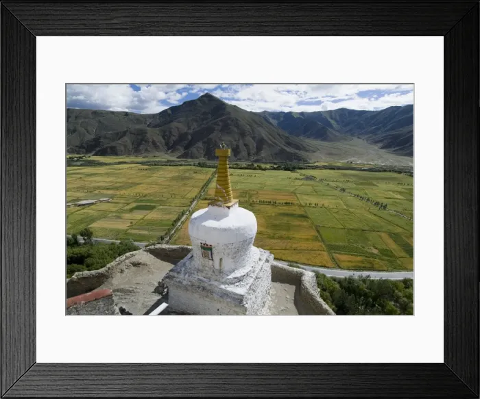 Framed Print : View over cultivated fields, Yumbulagung Castle, restored version of the regions oldest building, Tibet Framed Print : View over cultivated fields, Yumbulagung Castle, restored version of the regions oldest building, Tibet