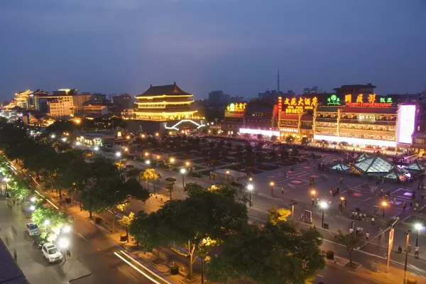 Chinese style buildings illuminated in Bell Tower Square, Xian City, Shaanxi Province