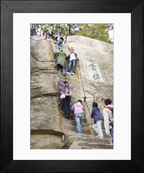Framed Print : People climbing the steep steps on Hua Shan, a granite peaked mountain Framed Print : People climbing the steep steps on Hua Shan, a granite peaked mountain