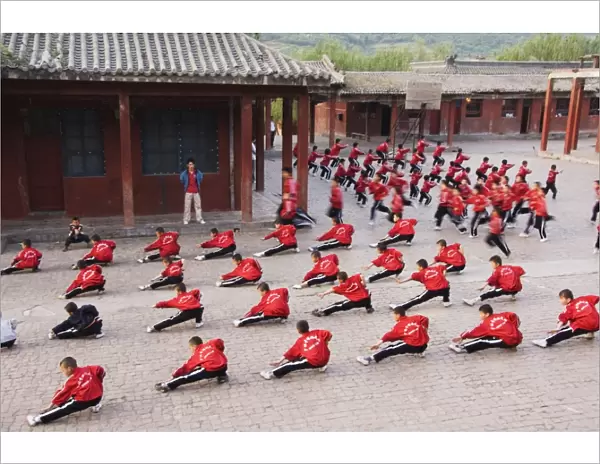 Students exercising and training at Wushu Institute at Tagou Training school for kung fu students