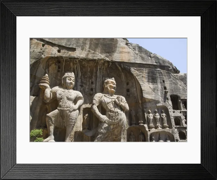 Framed Print : Carved Buddha images at Longmen Caves, Dragon Gate Grottoes, dating from the 6th to 8th Centuries Framed Print : Carved Buddha images at Longmen Caves, Dragon Gate Grottoes, dating from the 6th to 8th Centuries