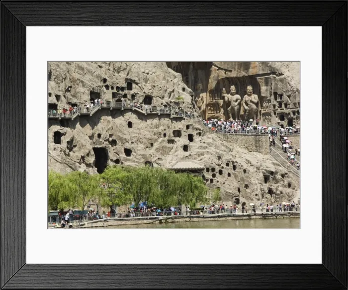 Framed Print : Carved Buddha images at Longmen Caves, Dragon Gate Grottoes, on the Yi He River dating from the 6th to 8th Centuries, UNESCO World Heritage Site, Henan Province Framed Print : Carved Buddha images at Longmen Caves, Dragon Gate Grottoes, on the Yi He River dating from the 6th to 8th Centuries, UNESCO World Heritage Site, Henan Province
