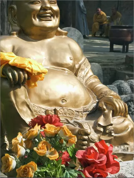 A golden Buddha statue at Shaolin Temple, birthplace of Kung Fu martial arts