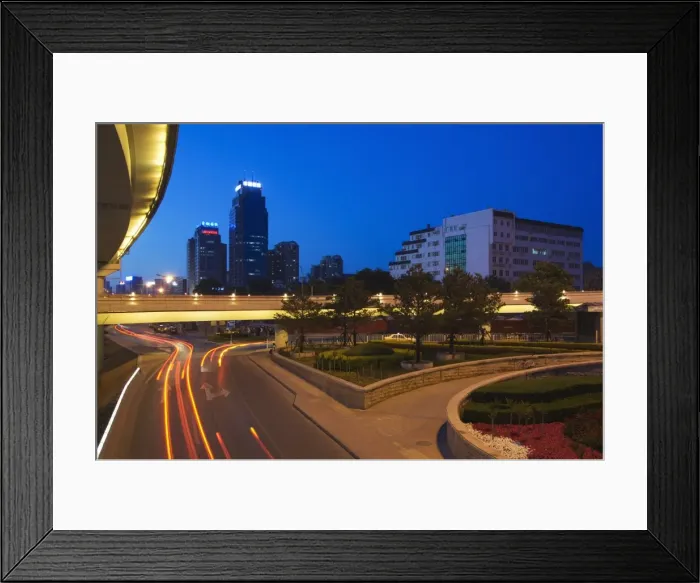 Framed Print : Car light trails and modern buildings near Beijing North Train Station Framed Print : Car light trails and modern buildings near Beijing North Train Station
