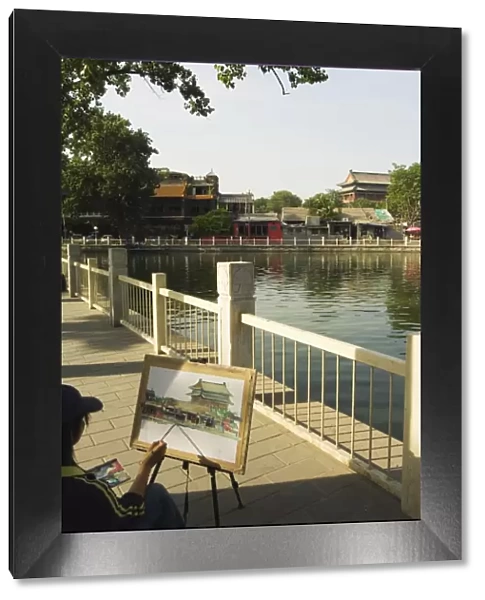 An artist painting at Houhai Lake, Beijing, China, Asia
